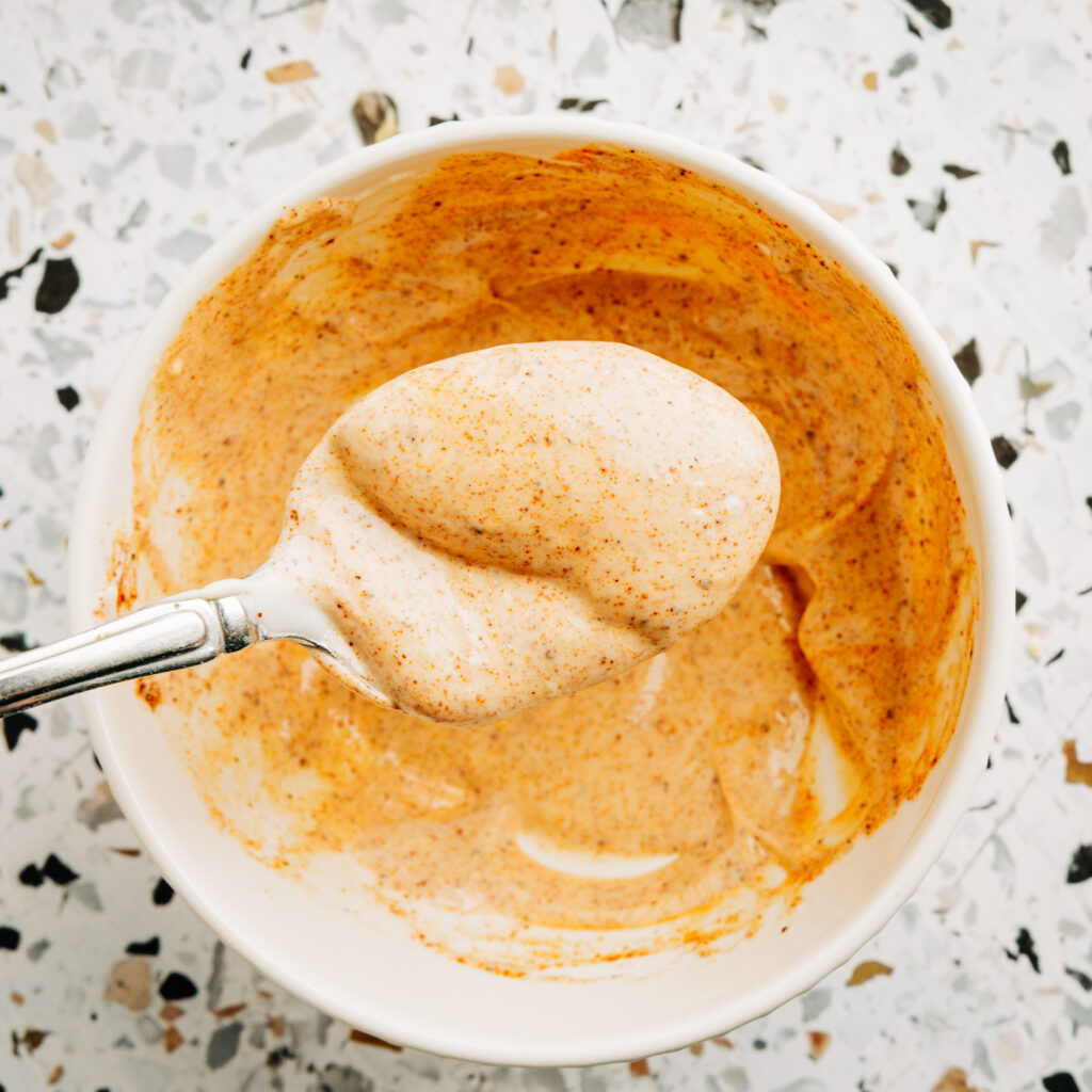 Homemade copycat Chili’s Santa Fe sauce made with clean ingredients and no seed oils in a small glass bowl