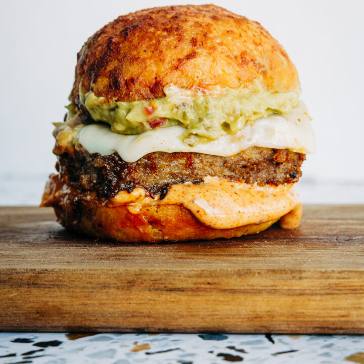 Copycat Chili’s Santa Fe burger sliders featuring juicy beef, melted cheese, homemade guac, and signature sauce.