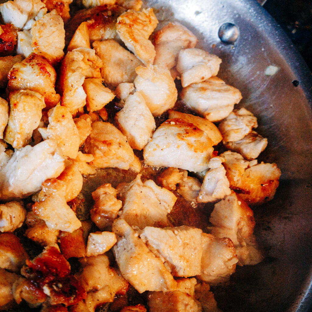 chicken cooked a few minutes browned on the outside